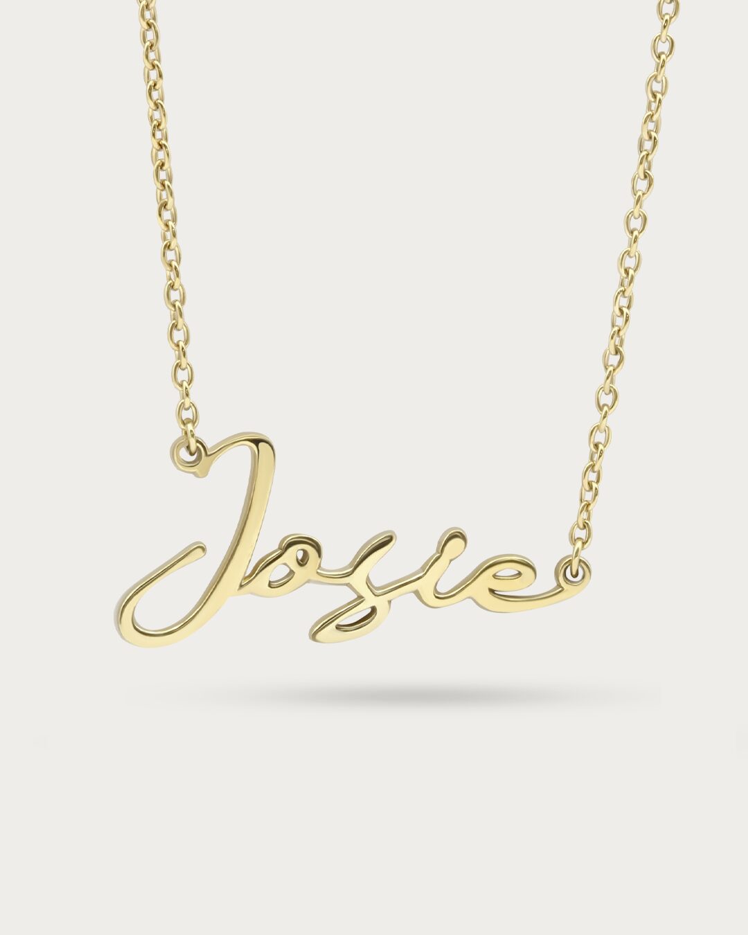 Handwritten signature necklace engraved by hand at the Colors By Love workshop in Bangkok