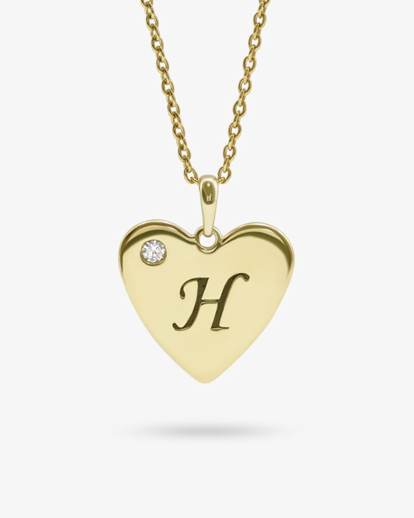 Custom heart pendant with a natural gemstone, made in Bangkok